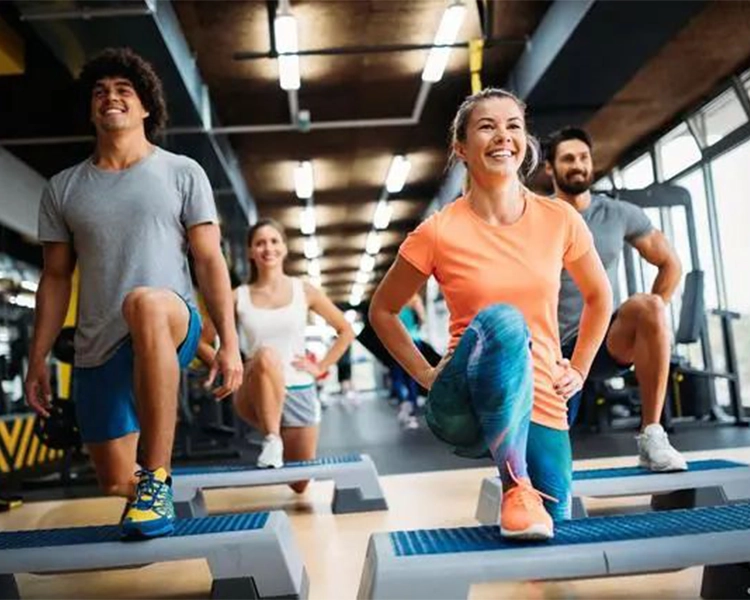 Four fitness enthusiasts are working out