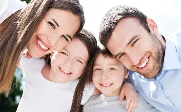 Happy photo of parents and children.