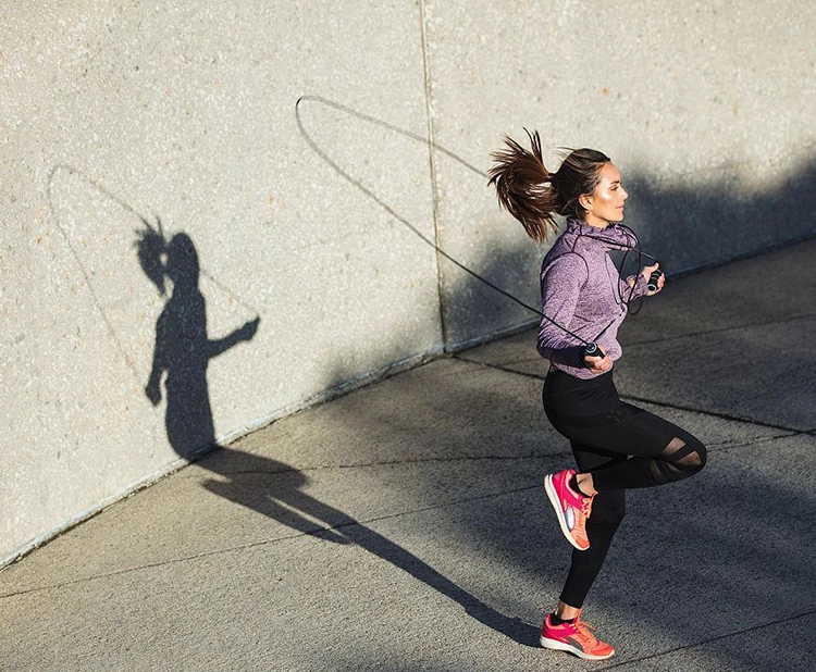 She creates more calorie deficits by skipping rope outdoors.