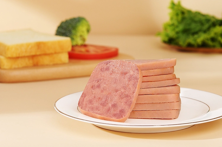 Bread slices, lunch meat, and vegetables are prepared on the table.