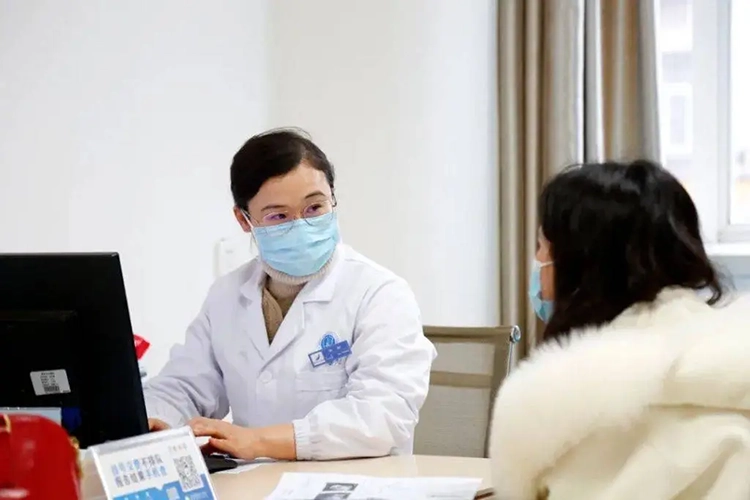 The woman is being examined by a doctor.